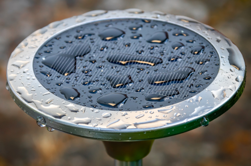 wet solar panel to signify the green energy whilst living in a campervan