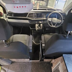 interior shot of a T6.1 Volkswagen Transporter Startline Campervan looking down at the front seats