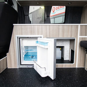 Interior view of the Ice Blue campervan with the fridge open