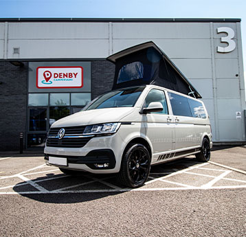 Denby Hi-Top Roof Conversion on a white Volkswagen campervan