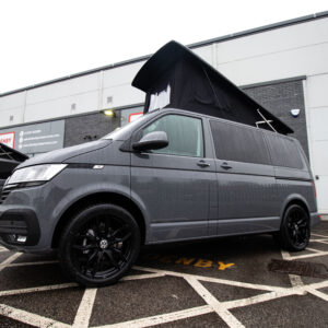 angled shot of a T6.1 Volkswagen Transporter Highline Campervan in Pure Grey with a pop top