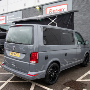 back shot of aT6.1 Volkswagen Transporter Highline Campervan in Pure Grey with a popped top