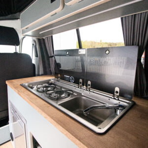 T6.1 Volkswagen Transporter Highline Campervan – Light Ivory – 24 Plate – A1198 stove and sink with lid open