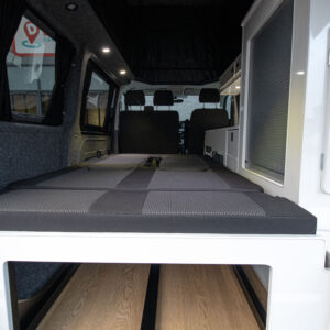 Rear seats folded down to make the bed shot from the rear door
