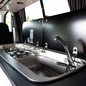 Close up of the sink and hob in the campervan