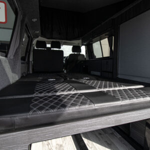Balmoral Deluxe SWB - T6.1 Volkswagen Transporter Highline Campervan – Pure Grey – 23 – A1267 with seats reclined to make the bed